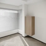 Compact slide-out study desk with organized book storage