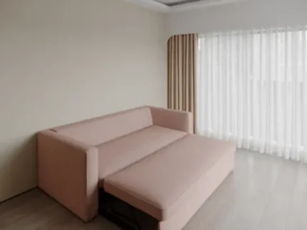 Modern fold sofa cum bed in a stylish living room.