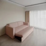 Convertible modern fold sofa cum bed for compact homes.